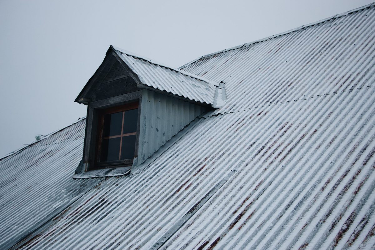 roof-building-covered-snow-against-cloudy-sky (1)